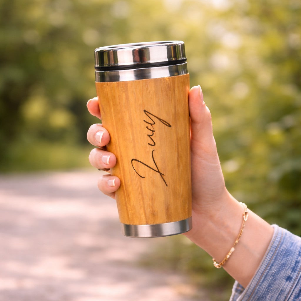 HouseEco personalised 500ml bamboo insulated travel mug with silver lid and a name engraved.