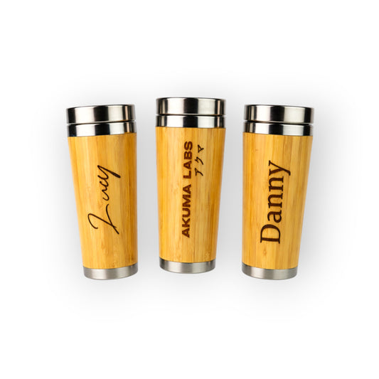 HouseEco personalised 500ml insulated bamboo travel mug with stainless steel lid. Features custom text engraving.