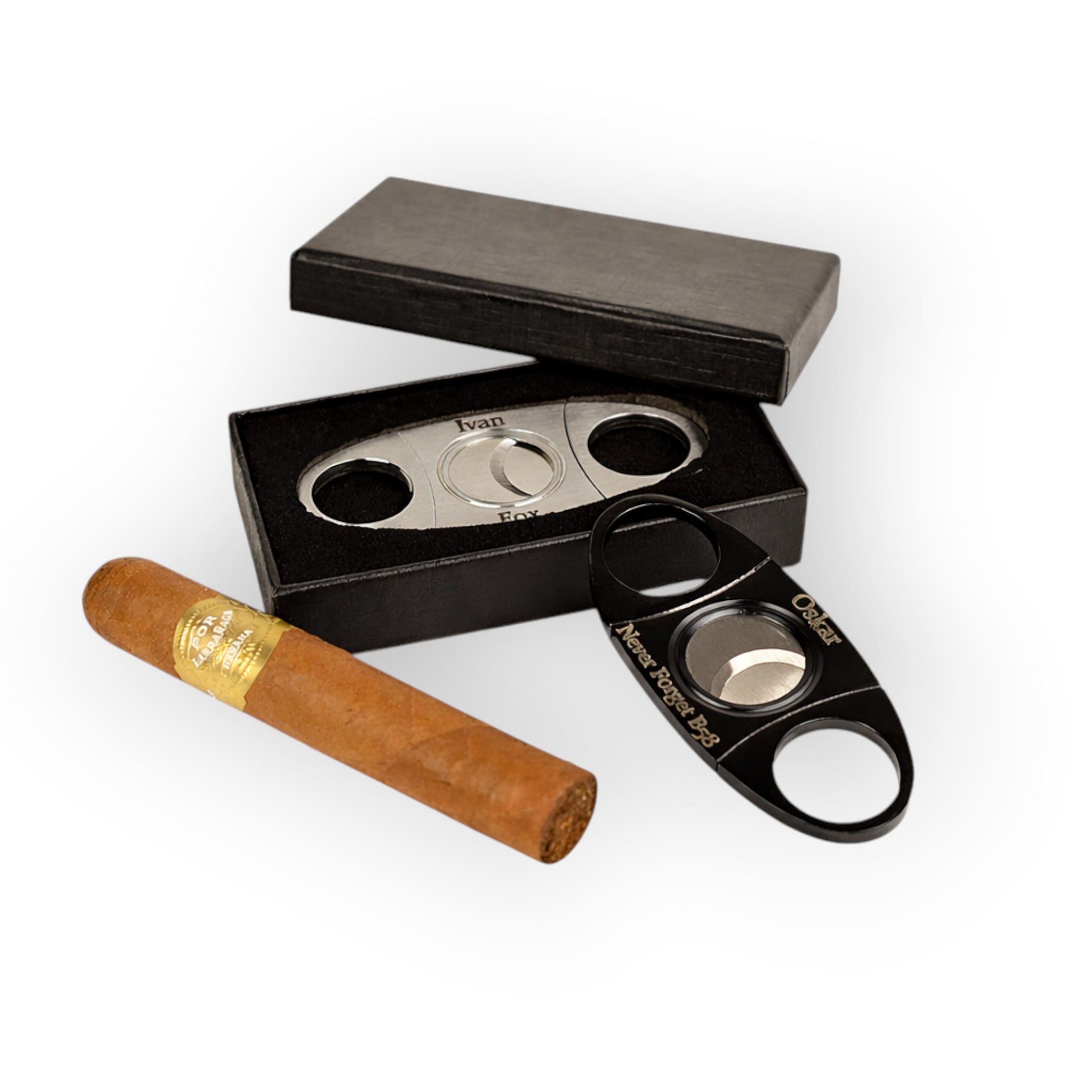 HouseEco personalised stainless steel cigar cutter with gift box and a cigar. Features custom engraving.
