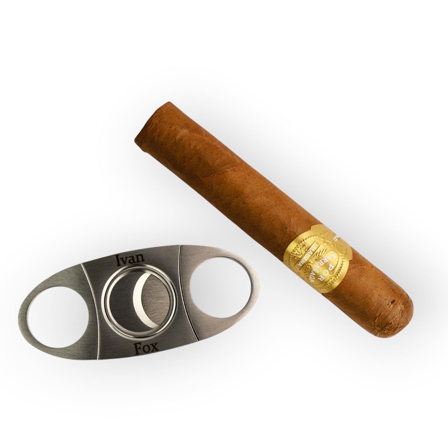 HouseEco personalised stainless steel cigar cutter with dual blades, engraved with 'Ivan Fox', next to a cigar.