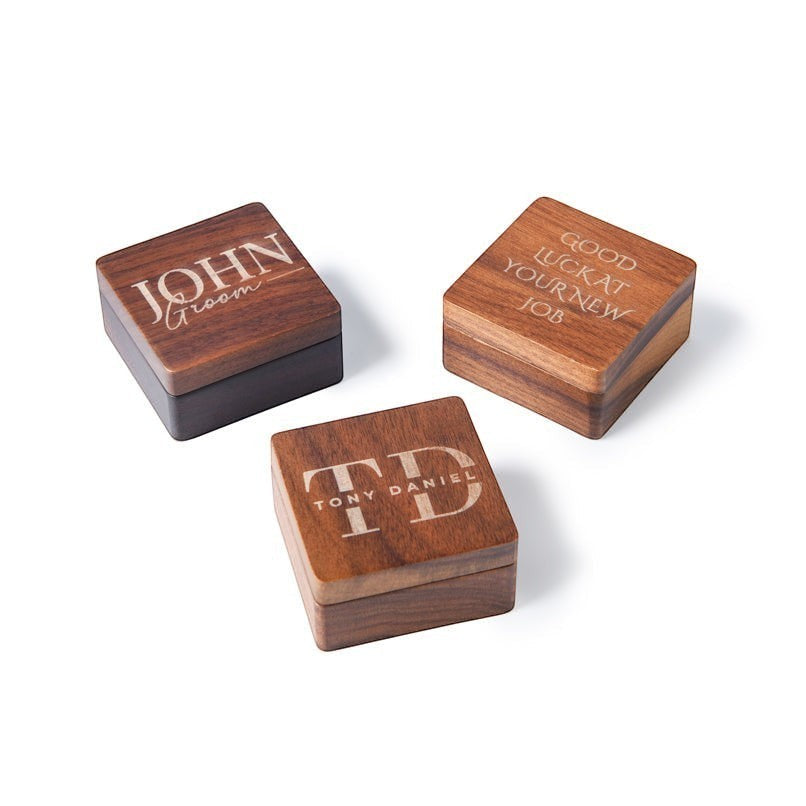 HouseEco personalised wooden gift boxes with engraved text like "John Groom", "TD Tony Daniel", and "Good Luck At Your New Job".