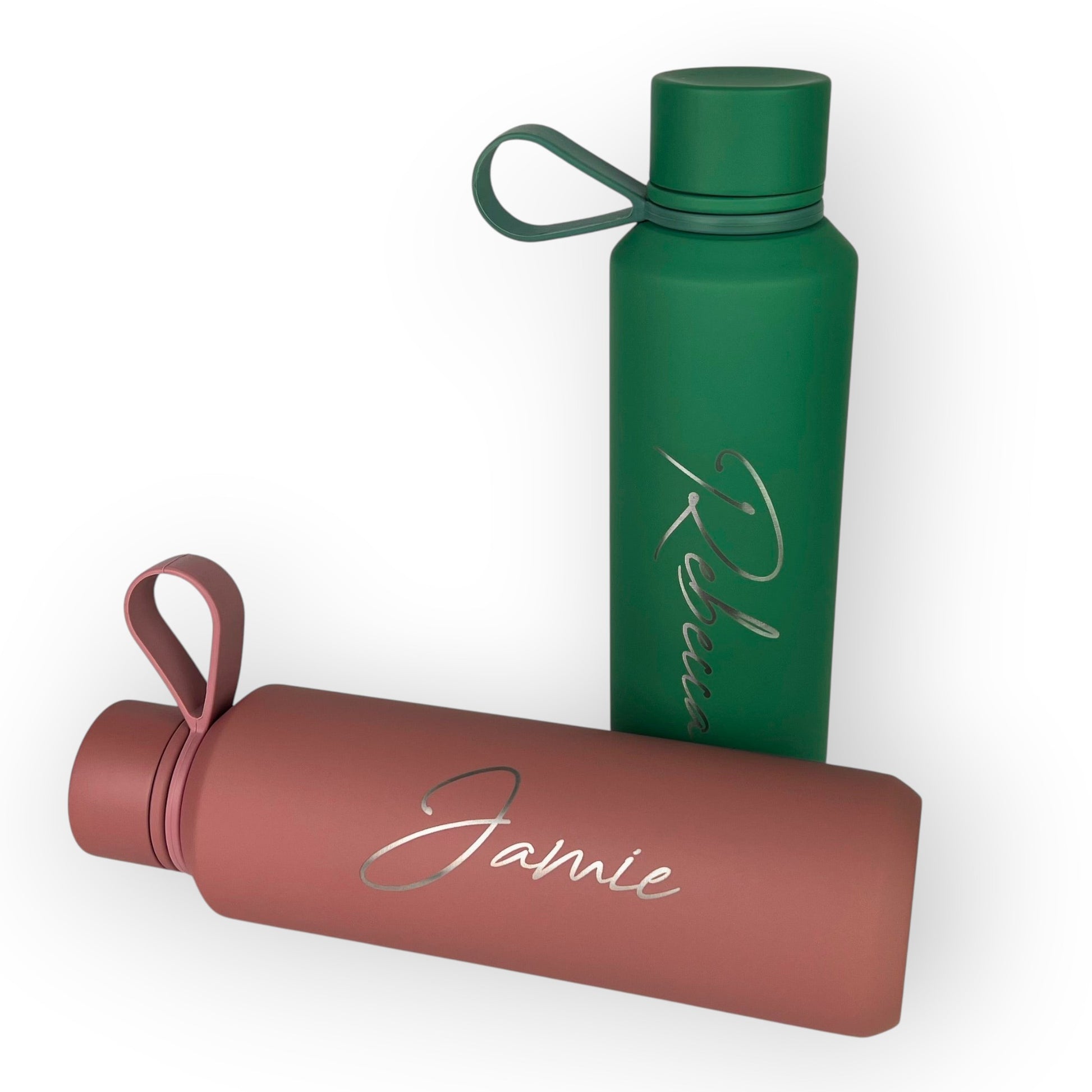 HouseEco personalised 600ml matte green and rose water bottles with silicone carry handles and custom names.