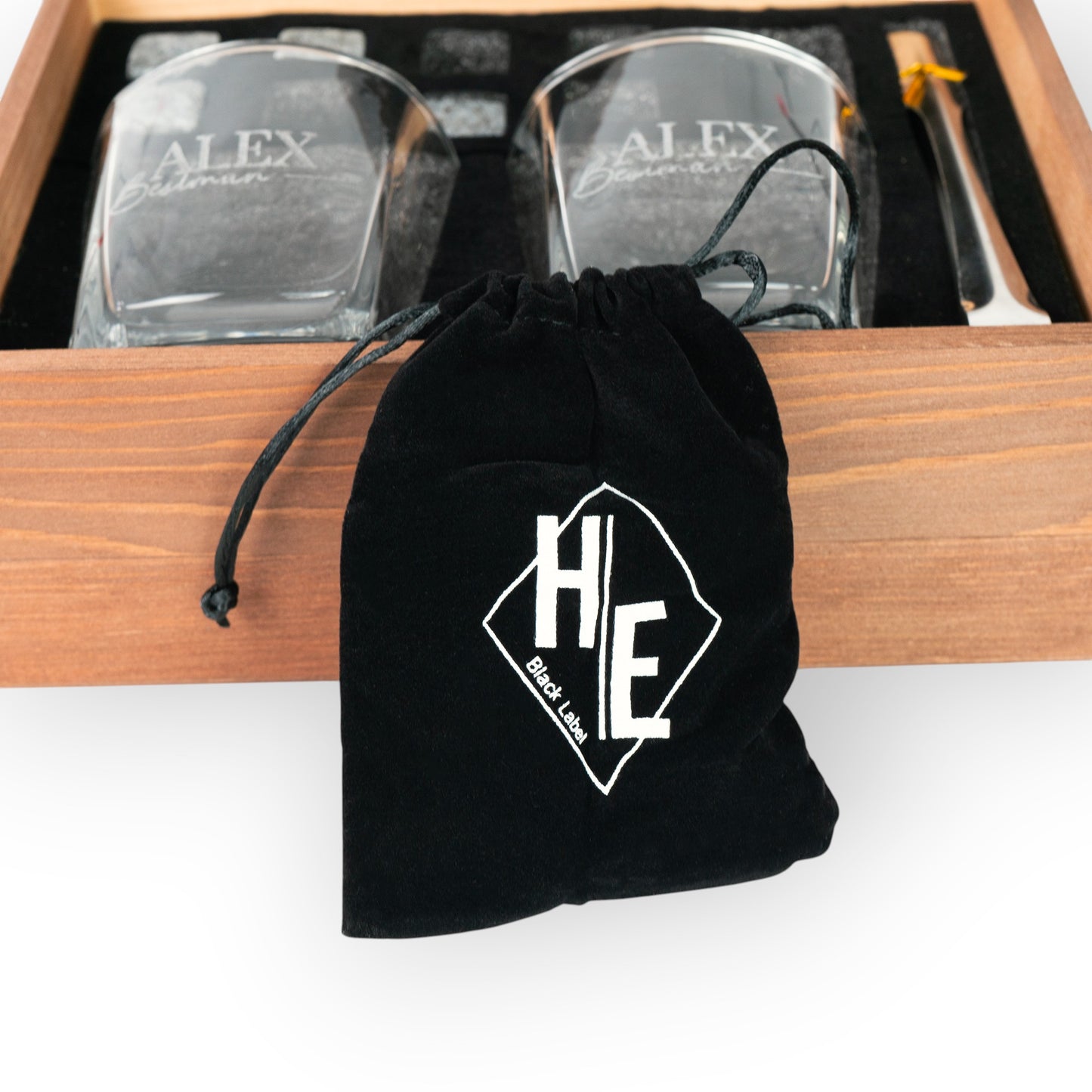 HouseEco personalised whiskey gift set with two engraved glasses, ice cubes, tongs, and wooden box.