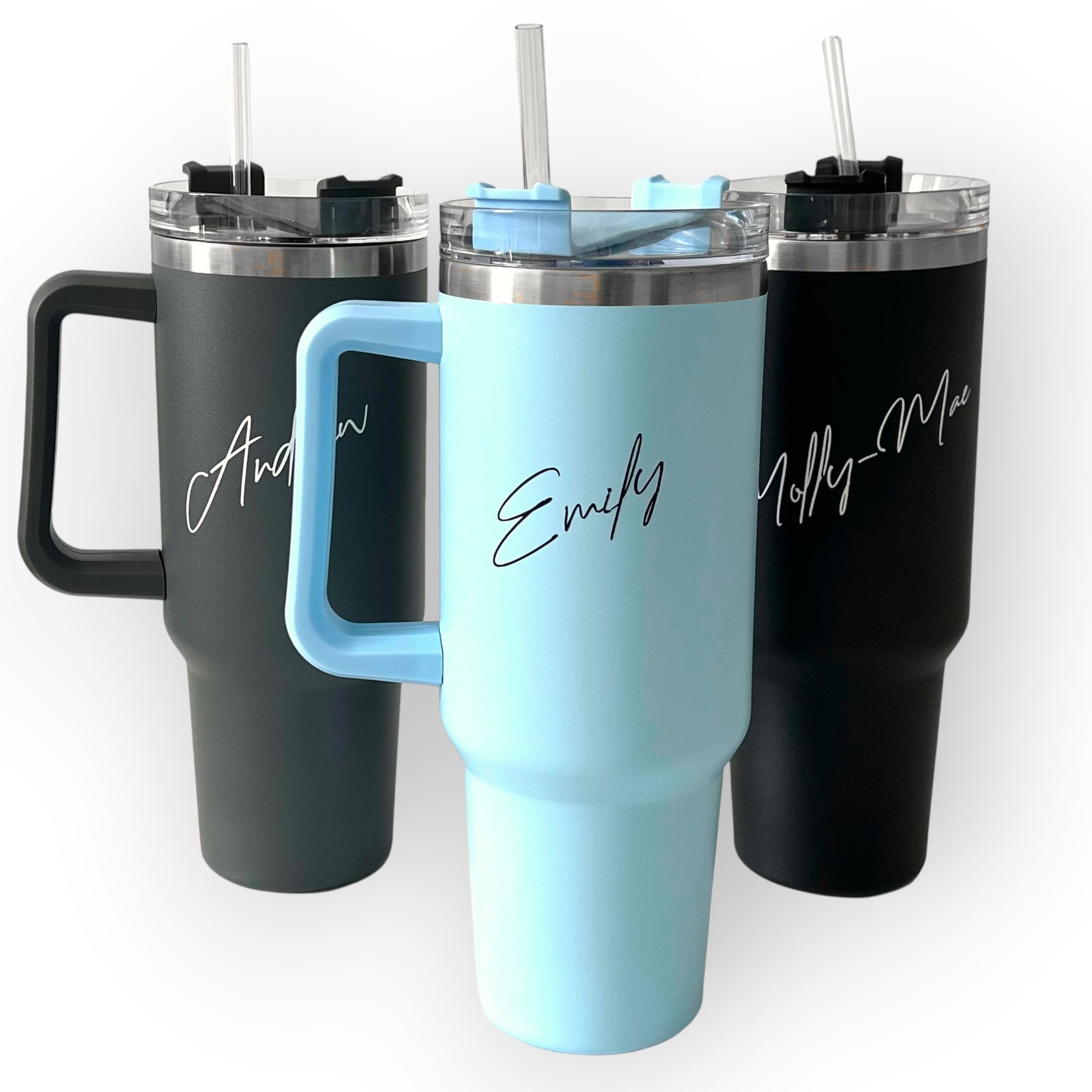 HouseEco personalised 1.2L insulated travel mug with handle and straw in black, light blue, and dark grey. Features custom name engraving.